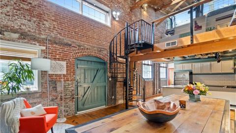 An early 1900s brick loft in Atlanta with three levels inside. 