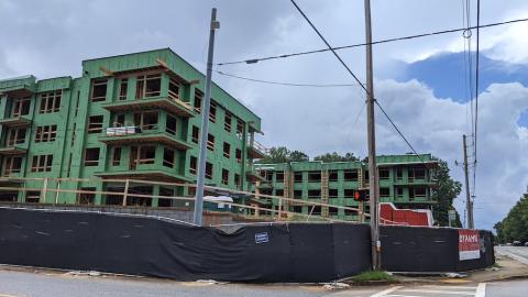 A construction project shown in Atlanta with apartments and retail. 