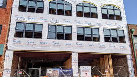 A white condo building that's rising from the ground now in Atlanta, GA. 