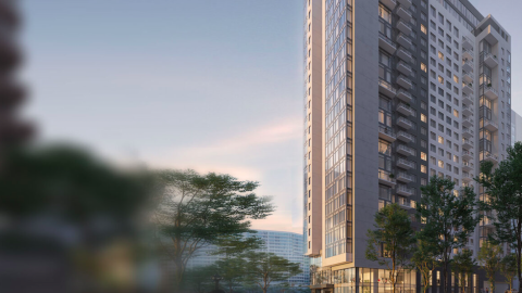 A rendering of a large apartment tower against blue skies on a busy Atlanta street.