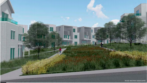 A rending of a field with new housing all around it. 