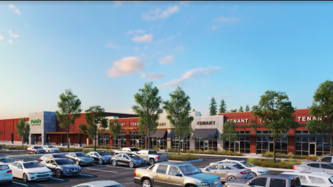 A rendering of a shopping center with tons of cars in front and a Publix grocery. 