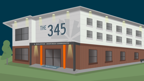 A rendering of a new affordable housing project with brick at the base and stucco above in Atlanta. 