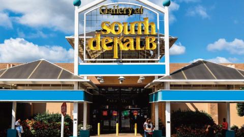 A photo of a typical old mall with stores and plants near Atlanta, Georgia. 