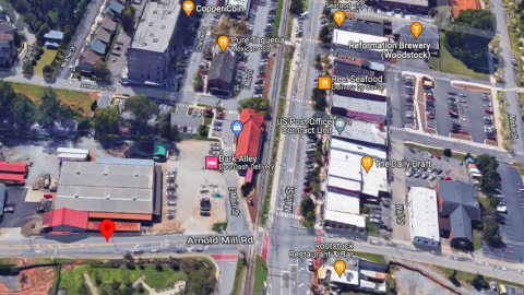An aerial photo of a city's downtown in suburban Atlanta with restaurants. 