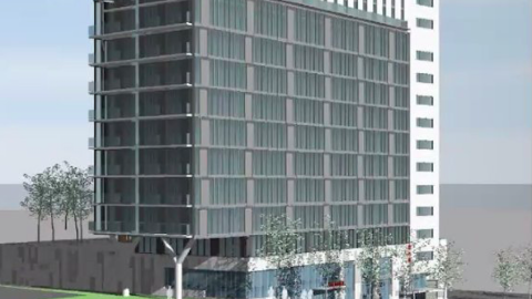 A rendering of a gray and white building near a sloping street in Atlanta. 