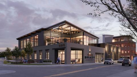 An image show the site of an office complex that's being built with a rooftop dining area. 