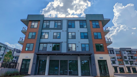 An image of a new stucco and glass apartment community with white interiors on Atlanta's eastside. 