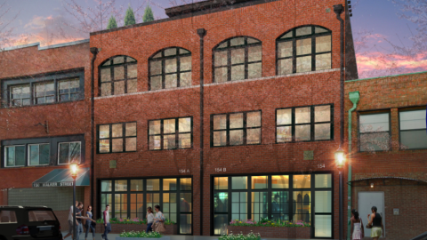 A rendering of a small brick apartment building under pink purple skies in Atlanta. 