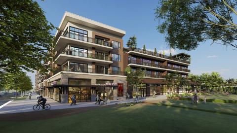 A rendering for a large beige and brick development under construction under blue skies in Atlanta. 