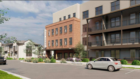 A rendering showing white townhomes and an apartment building under blue skies in Atlanta. 