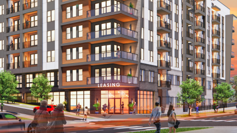 A rendering of an apartment complex shown on a busy street in Atlanta. 