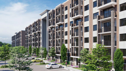 An image of a huge new apartment complex site location under blue skies with many balconies in the Decatur city near Atlanta. 