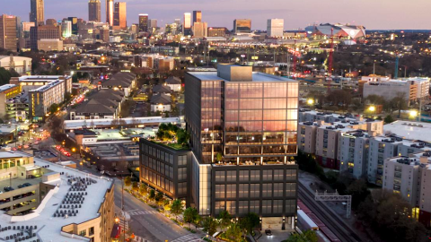 a rending of a mid-rise building in Atlanta near rows of other buildings. 