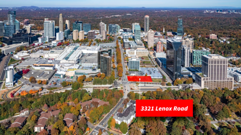 An image of a mall area in Atlanta with many tall buildings around under gray blue skies.