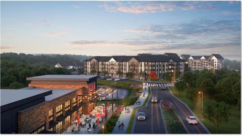 A rendering of a mix of townhomes and apartments at the end of a long boulevard near many trees.