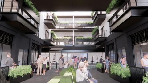 A rendering of a large new building with a courtyard and many balconies on a sunny day in Atlanta.