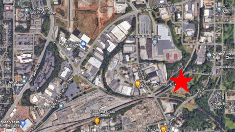 An image of a townhome site near a large industrial area coming together outside Atlanta. 