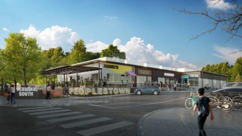 A rendering of a food hall made from an old building under blue skies in Atlanta.