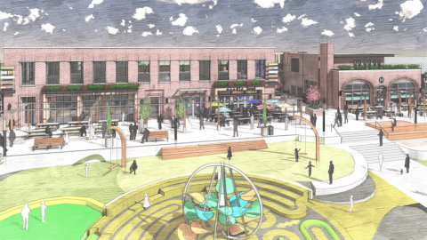 A rendering of a two-story new development next to a large public park under darks skies. 