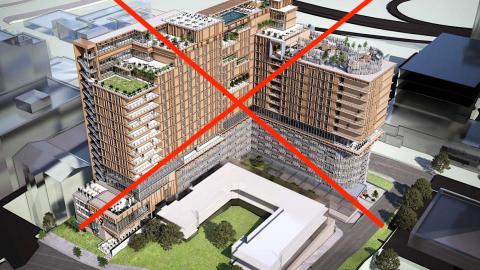 A rendering of a tall brown and gray building with a red X through it. 