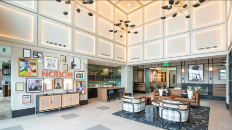 A photo of a new large apartment complex in Atlanta with fancy interiors. 