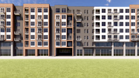 A rendering of a large brick and glass structure fronting a street under blue skies in Little Five Points Atlanta. 