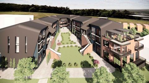 A rendering depicting modern-style buildings in brown and tan beside a large greenspace with many large houses around.