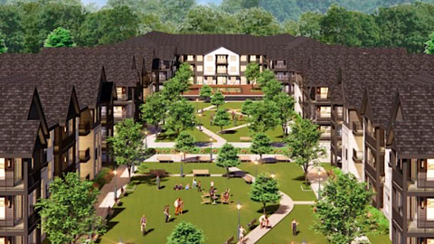 A rending of a development with housing under brown roofs and a large greenspace near many trees.