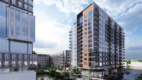 A rendering of a glassy tower next to another tall building under blue skies in Atlanta.