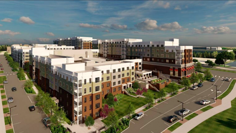An image showing plans for a large senior house complex with red brick and white exterior walls near wide streets.