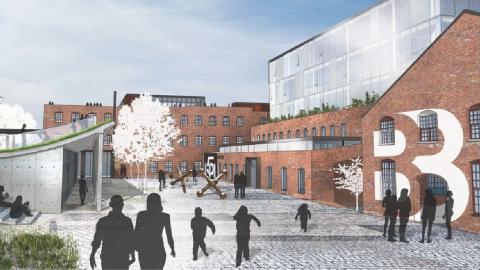 A rendering of a new development within many old buildings under blue skies in Atlanta.
