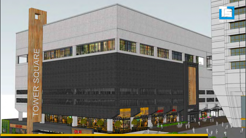 A rendering of a large blocky building under white skies with much retail inside. 