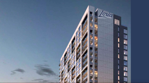 A rendering of a large new building under blue gray skies in Atlanta near a wide street.