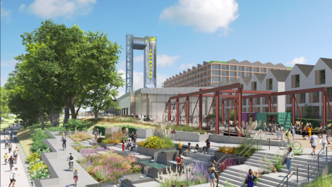 A rendering showing a huge warehouse district transformed into new housing and shopping areas under blue skies on Atlanta's Westside.