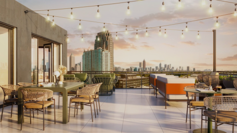 A rendering of a large wedge-shaped apartment building near Atlantic Station in Atlanta under blue skies with many windows and amenities and a rooftop pool, with clean modern interiors.